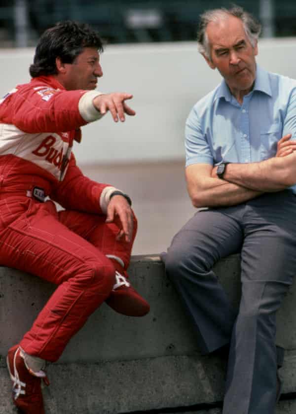 Mario Andretti, speaking with Eric Broadley during a break in practice for the Indianapolis 500 in 1993.