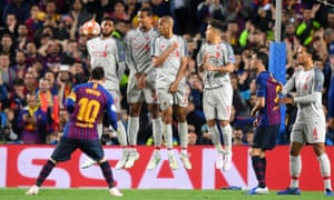 Barcelona’s Lionel Messi scores their third goal from a free kick.