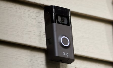 A Ring doorbell camera mounted on a featherboarded home