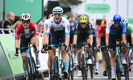 Matevz Govekar screams with joy on his cycle after winning the final stage