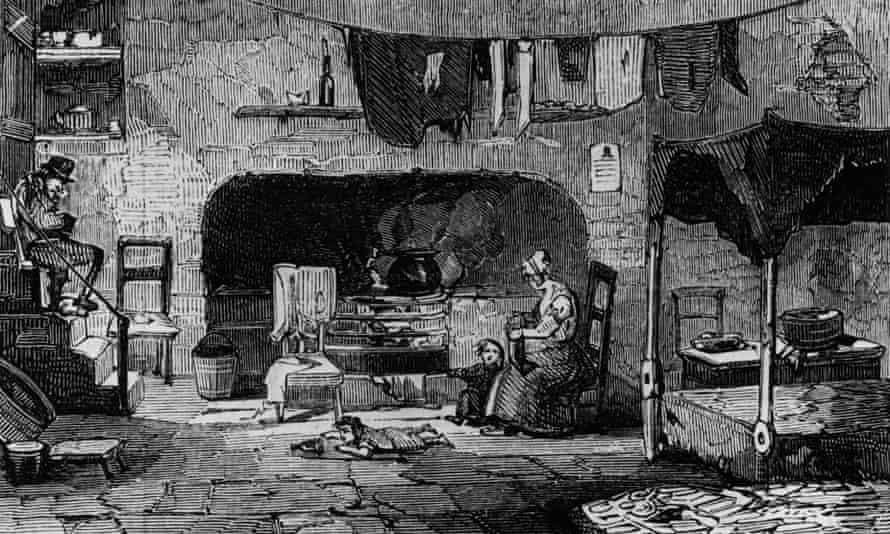 A family living in a cellar near St Giles, London.