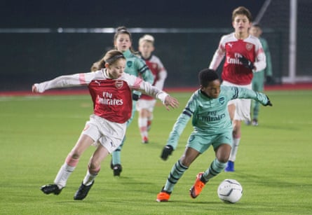 Laila Harbert (left) training pinch boys astatine Arsenal.
