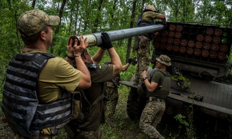 Ukrainian servicemen prepare a Grad multiple-launch rocket system to fire towards Russian positions in Kharkiv earlier this month