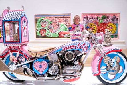 Grayson Perry’s teddy bear, Alan Measles, is transported in a glass carriage on the back of a motorbike.