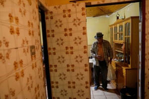 Alvaro Martin Perez, 84, prepares to leave his home as he is evacuated from the San Borondón neighbourhood in Tazacorte
