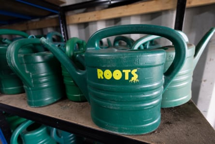 A Roots watering can