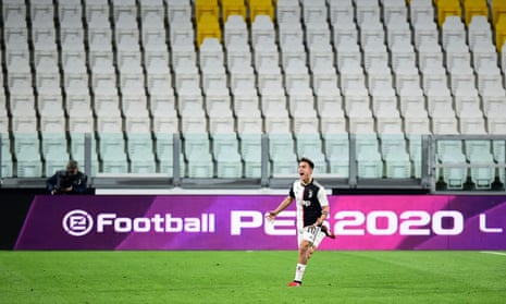 Paulo Dybala celebrates scoring for Juventus against Inter in a game played behind closed doors on 8 March. 