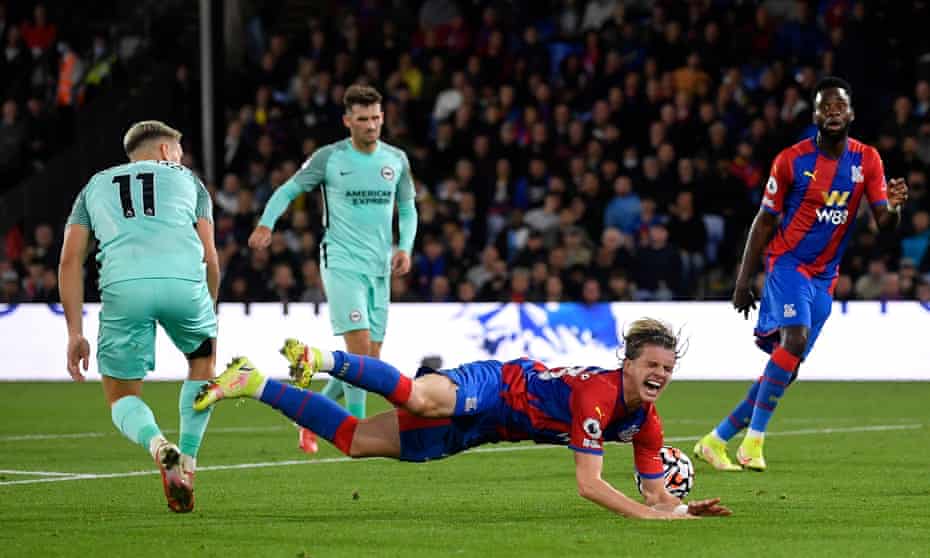 Leandro Trossard (left) is judged to have fouled Crystal Palace’s Conor Gallagher at the end of the first half.