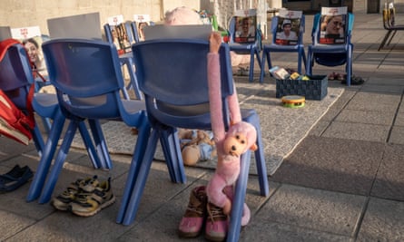 An installation at Safra Square in Jerusalem portrays an empty kindergarten, with photos of 30 Israeli child hostages
