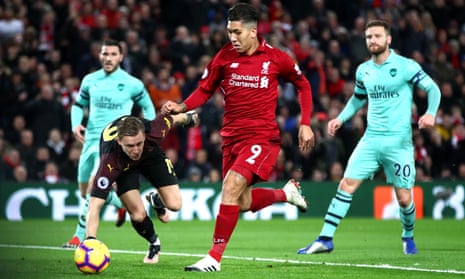 Roberto Firmino scores the first goal of his hat-trick in Liverpool’s 5-1 thrashing of Arsenal at Anfield last season. 