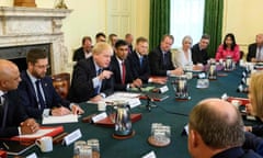 Boris Johnson chairs a Cabinet meeting at 10 Downing Street the morning after surviving a no-confidence vote.