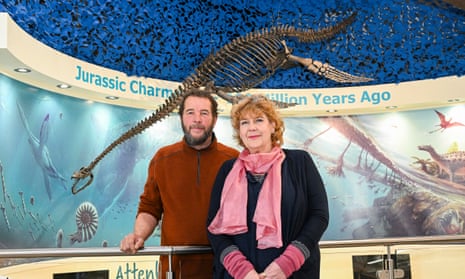 Tracey Barclay and Chris Moore at the Charmouth Heritage Coast Centre next to the plesiosaur fossil that Raffle the dog found on Monmouth beach.