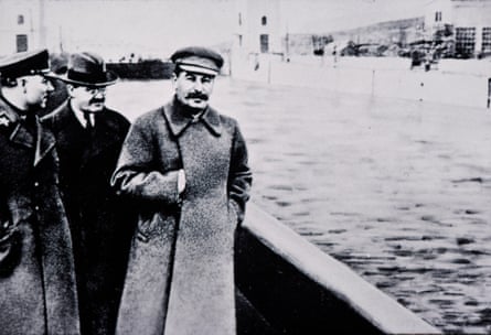 Black and white image of Stalin walking along the banks of the Moscow-Volga canal, April 1937. Nikolai Yezhov was originally in the picture with him but was later removed