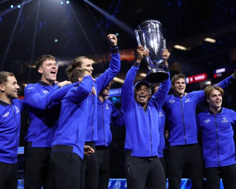 Team Europe captain Yannick Noah holds the Laver Cup trophy aloft at The O2 Arena in London.