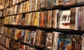 A shelf of DVDs for sale