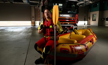 Brad Mitchell wearing rescue gear at a Queensland Fire and Rescue Service station in Brisbane