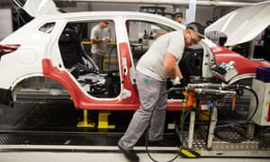 Workers on the production line at the Nissan car factory in Sunderland.