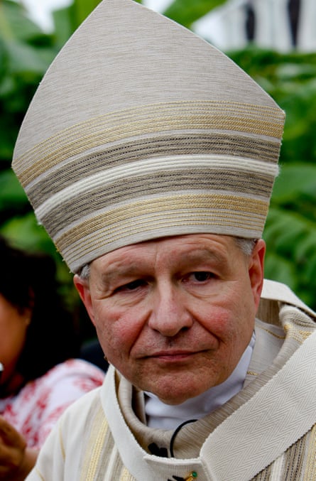 Older white man in tall pointy hat.