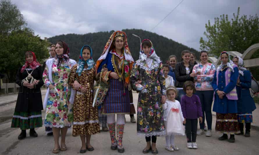 A Pomak bride is escorted during her three-day wedding ceremony in the village of Draginovo, Bulgaria.
