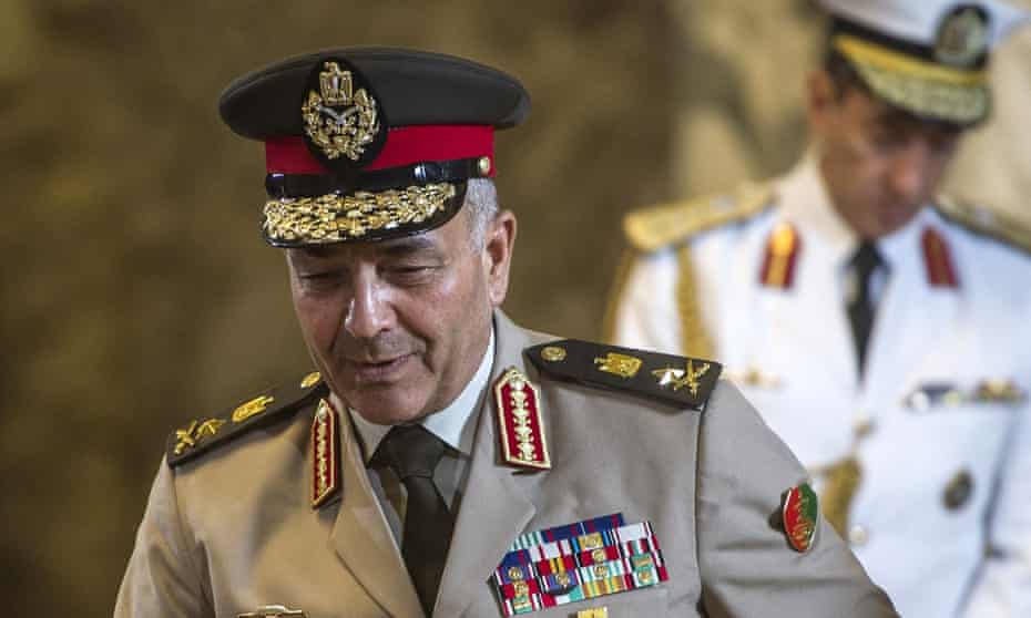 Egyptian army’s chief of staff Mahmoud Hegazy arrives for a ceremony to sign military contracts at the presidential palace in Cairo. 
