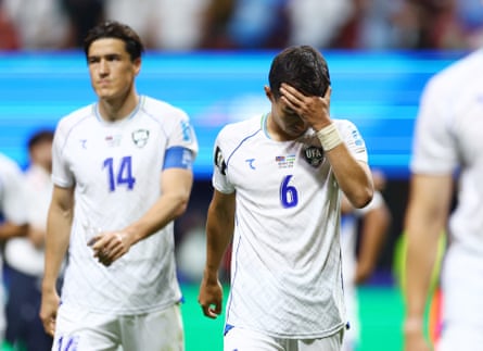 Uzbekistan’s Akmal Mozgovoy looks dejected