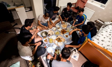 The Afghan refugees have dinner together