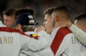 Owen Farrell offers his team some words of encouragement in the England team huddle after the match.