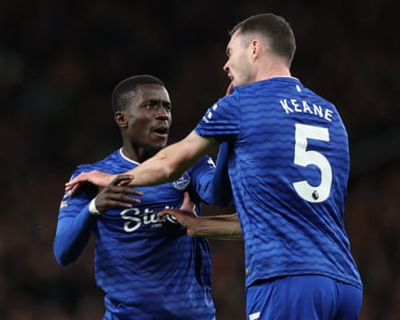 Idrissa Gueye slaps his Everton teammate Michael Keane