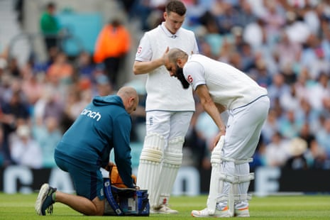 Moeen Ali receives treatment for a groin injury