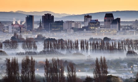 Smog and smoke from wood and coal fires at dawn in Christchurch, New Zealand.