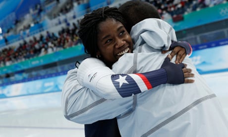 Erin Jackson celebrates her Winter Olympics speedskating gold with with coach Ryan Shimabukuro