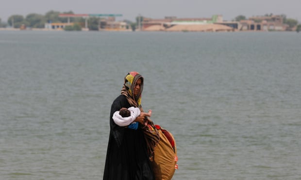 Woman carrying child