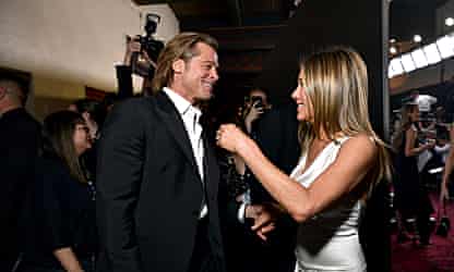 Why is the world so obsessed with the new pictures of Brad Pitt and Jennifer Aniston?