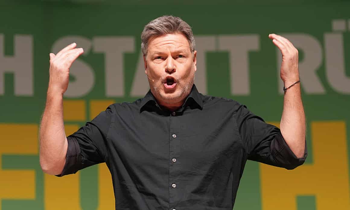 Robert Habeck gestures with his hands raised