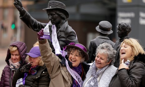 Women campaigning against state pension inequality mark International Women’s Day at the statue of political activist Mary Barbour in Govan, Glasgow.