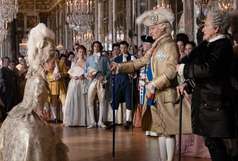 Maïwenn as Jeanne in 18th-century dress and great tall wig, curtsies to Johnny Depp as the king in Jeanne du Barry