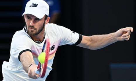 Tommy Paul of the United States plays a backhand