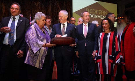 Malcolm Turnbull and Bill Shorten receive the Redfern statement, a blueprint for improvement in Aboriginal and Torres Strait Islander affairs, before the release of the Closing the Gap report