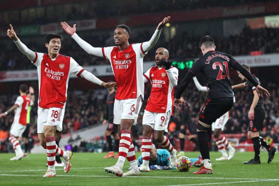 Takehiro Tomiyasu, Gabriel and Alexandre Lacazette of Arsenal argue with the linesman as a goal is ruled offside against Southampton. Arsenal still won the match 3-0.