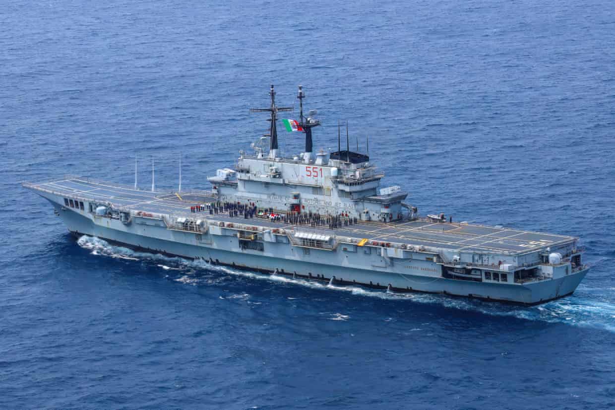 Sailors on deck of aircraft carrier