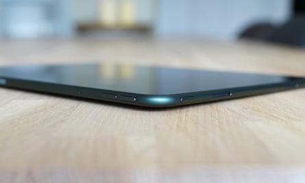 The rounded edge and buttons of the OnePlus Pad.