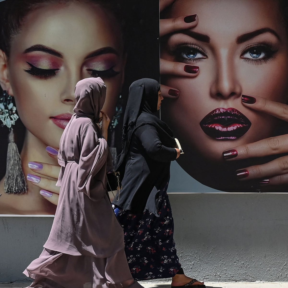 Afghan women's defiance and despair: 'I never thought I'd have to wear a burqa. My identity will be lost' | Global development | The Guardian