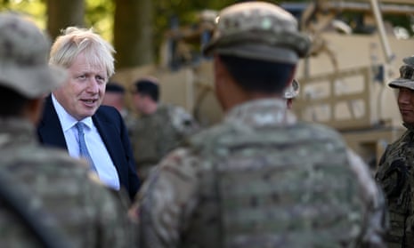Boris Johnson speaking to Ghurkas during a visit to military personnel on Salisbury plain training area.