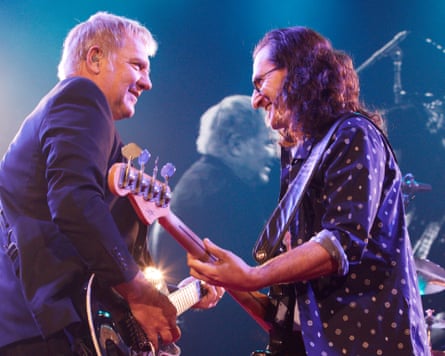 Lifeson (left) and Lee on tour in 2012.