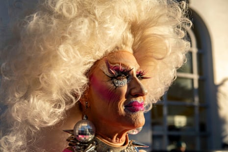 A fan of Dolly Parton gathers to celebrate the life of the country singer at Harvey Milk Plaza in the Castro District of San Francisco.