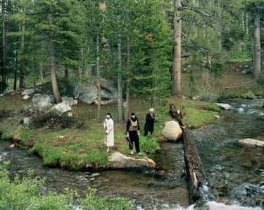 Marines sergeant John Sexon, lance corporal Cameron Stark and lance corporal Joshua Stevens role playing as Taliban fighters, 2009 ‘This a marine unit in Lake Tahoe, training for Afghanistan. Amid shooting, a marine suggested they ford the river and pose for me on the other side. It was an amazing gift. They took off their boots, crossed and posed barefoot. The combination of their feet, the river, and their stance has a primordial feel’