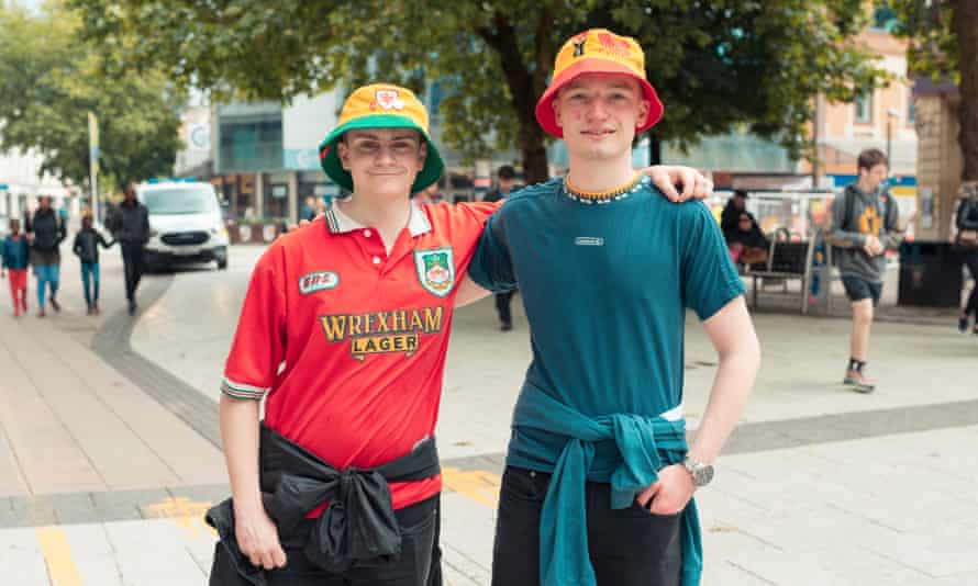 Deian, left, and Will, in bucket hats.