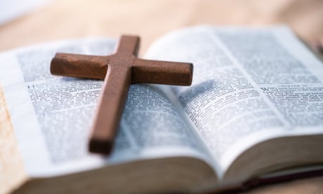A cross on a bible