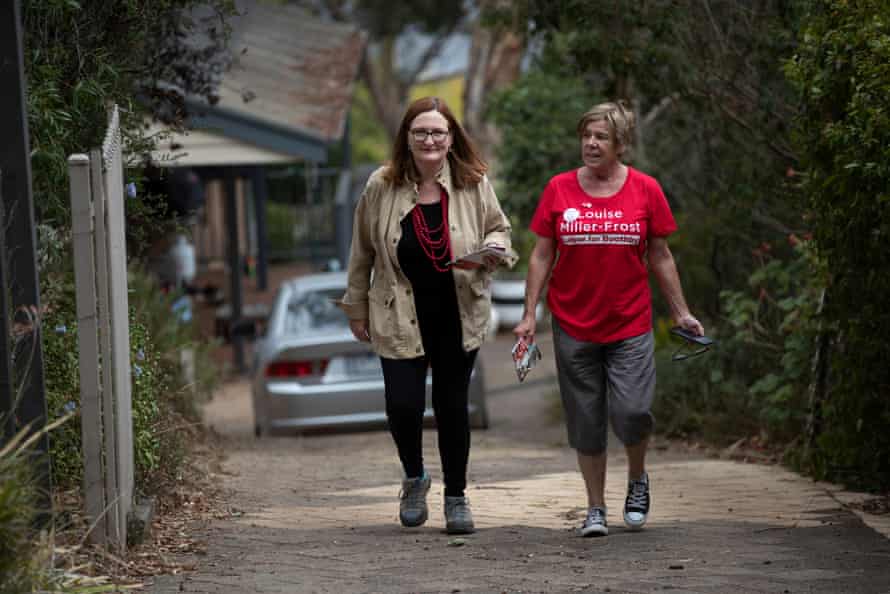 Labor candidate for the South Australian federal seat of Boothby for the 2022 federal election Louise Miller-Frost (left) door knocking in Blackwood with electoral worker Aileen Croghan.