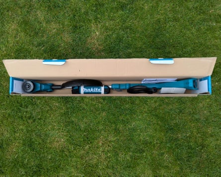 Makita grass trimmer in its cardboard packaging.